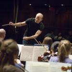 CSO maestro Paavo Jarvi conducts a practice session with the CCM Philharmonic.