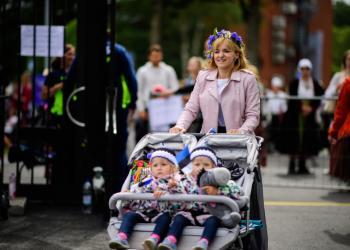 A woman with two children at Estonian Song Celebration in 2019. Photo by Sven Zacek.