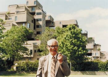 August Komendant in front of the Habitat ’67 housing complex in Montreal, Canada, ca. 1980. © Estonian Museum of Architecture.