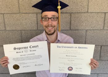 Henry Lindpere in July 2020 with his juris doctor diploma and Arizona Supreme Court certificate of admission. Private collection.