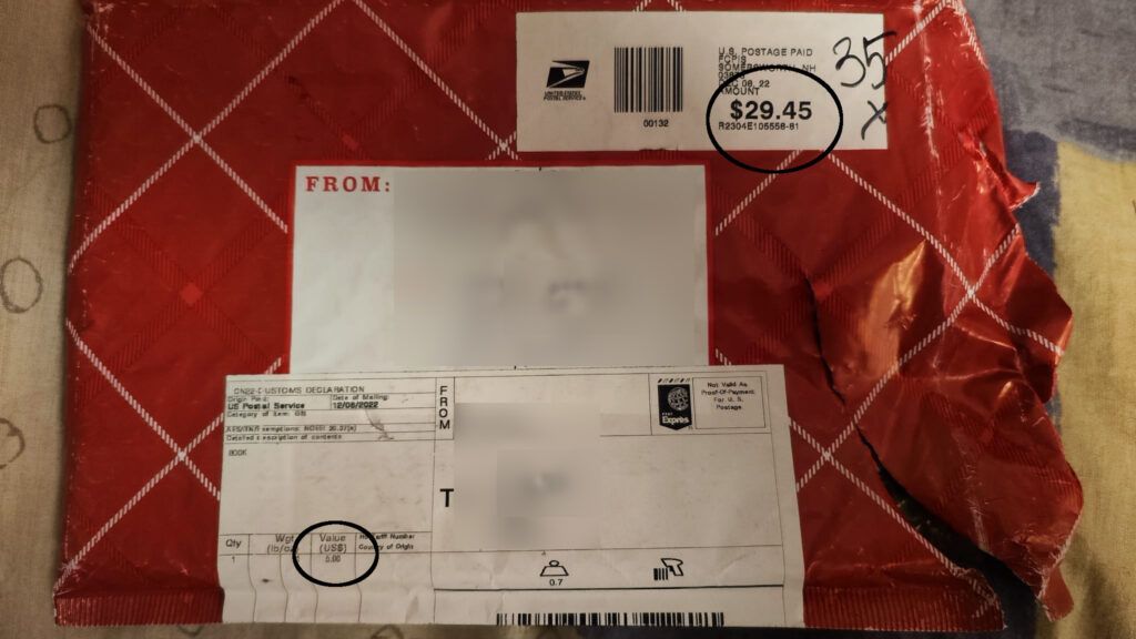 The envelope in which the book arrived in Estonia, clearly showing both the value of the package and the shipping cost.