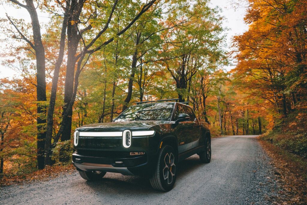 Rivian is an American electric car manufacturer that is becoming more and more popular. Pictured, the Rivian R1T. Photo by Wes Hicks on Unsplash.