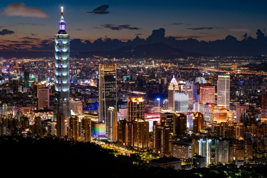 The Taiwanese capital, Taipei, at night. Photo by Timo Volz on Unsplash.