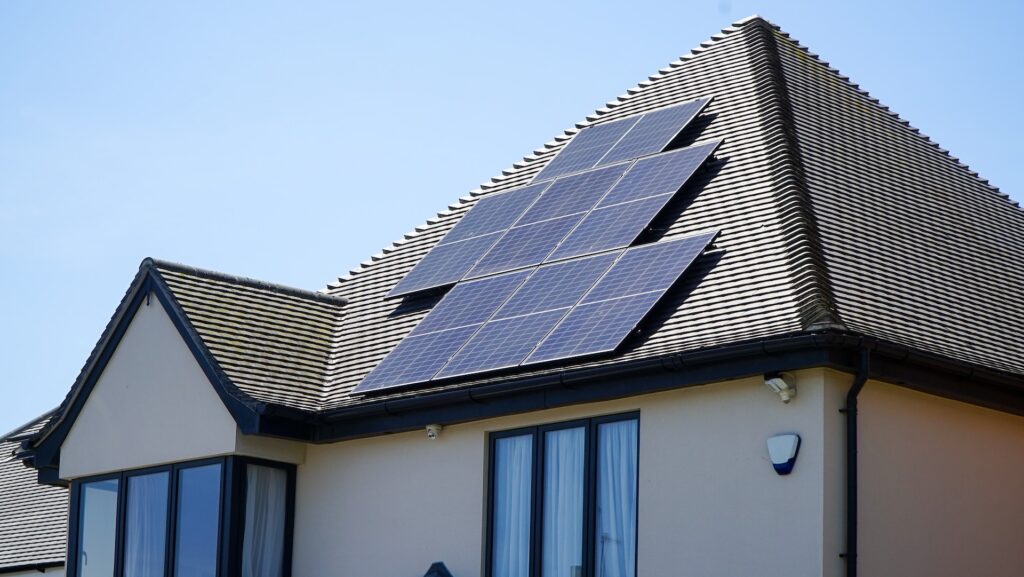 Solar panels on the roof of a house. The image is illustrative. Photo by Watt A Lot on Unsplash.