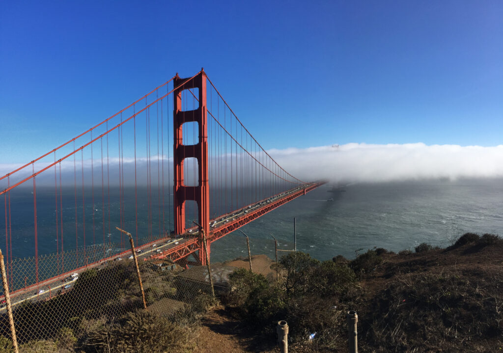 The Golden Gate Bridge, a symbol of San Francisco. The City of San Francisco is in the fog that is locally known as Carl the Fog. Photo by Sten Hankewitz.