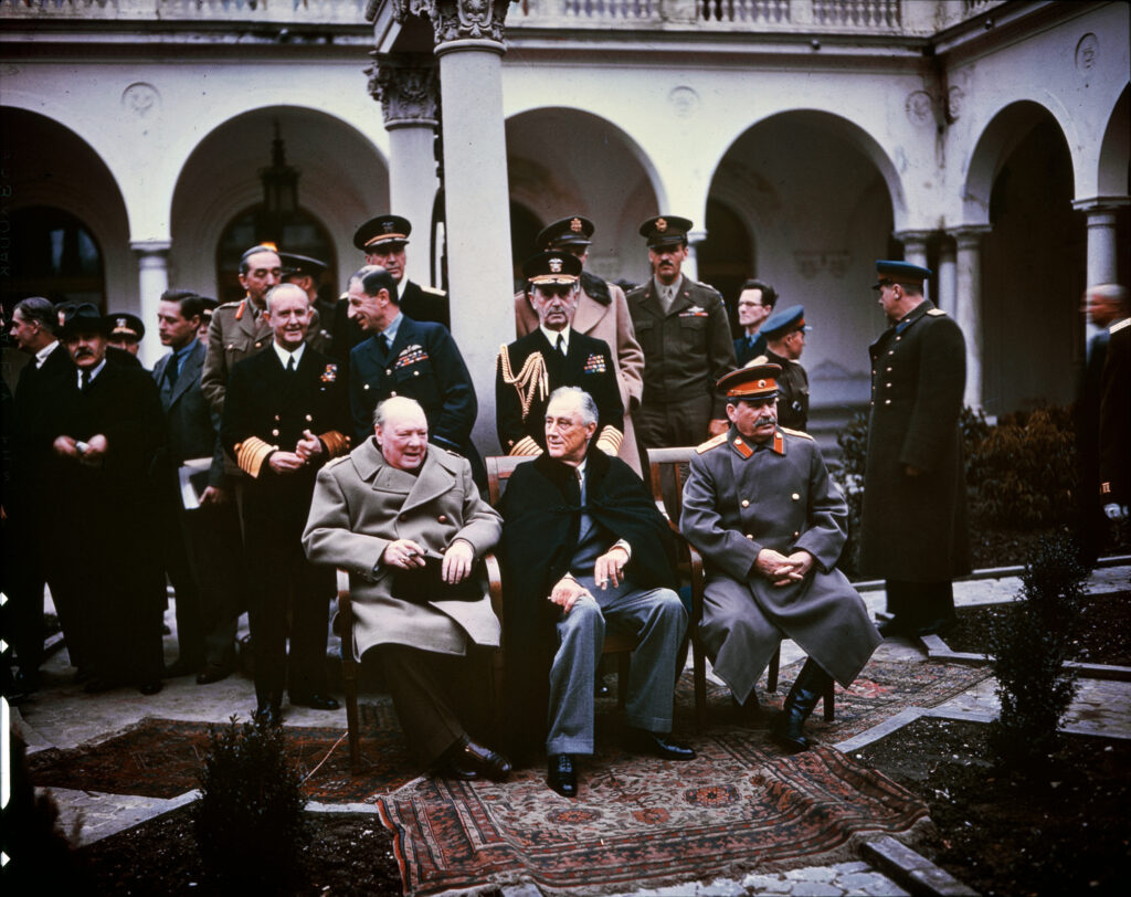 Winston Churchill, Franklin D. Roosevelt, and Joseph Stalin at Yalta Conference in 1945. Public domain.