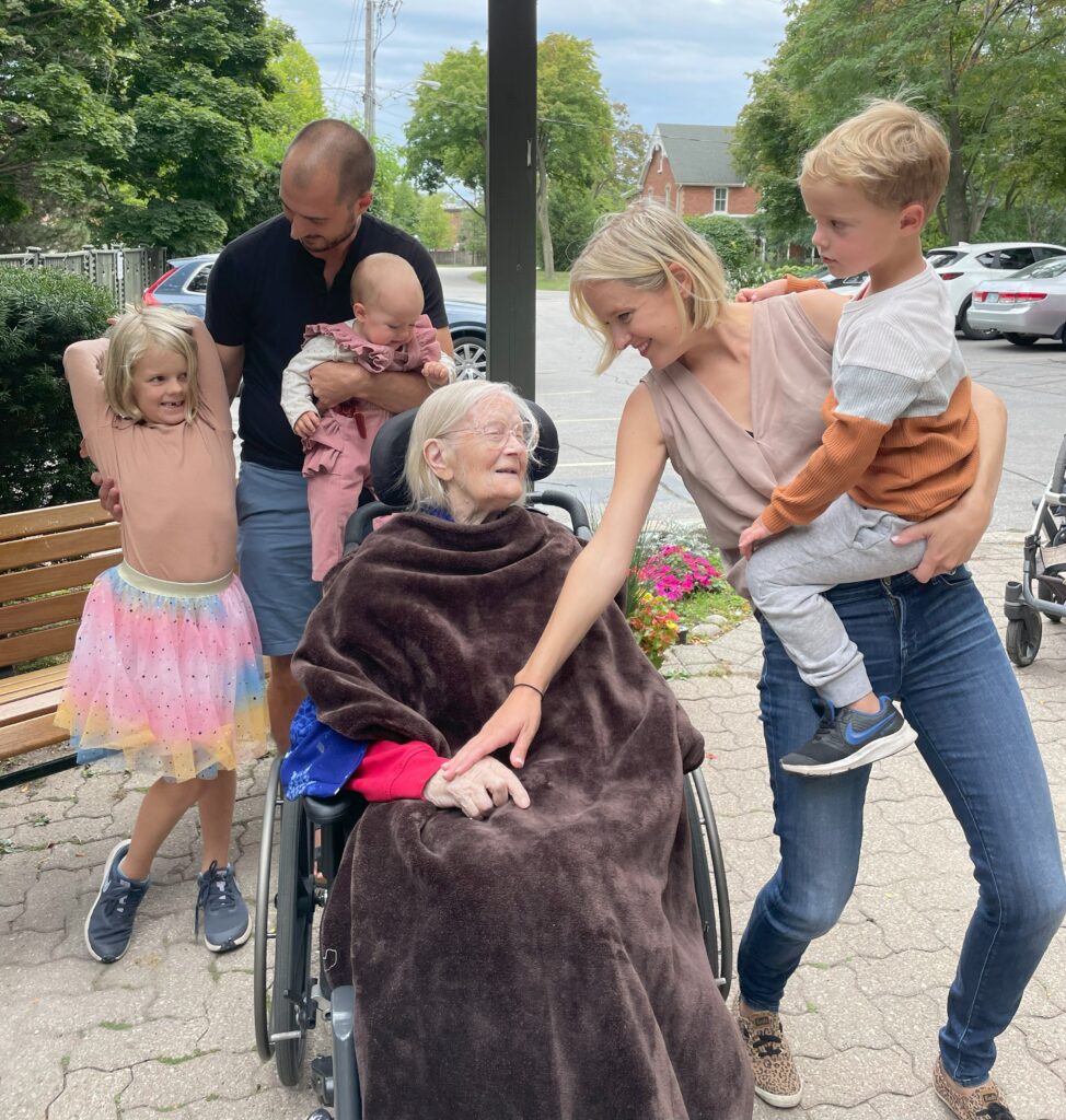 Eha, joyfully surrounded by her great-grandchildren at Ehatare Senior’s Home outside Toronto –continuing her legacy through future generations. Private collection.
