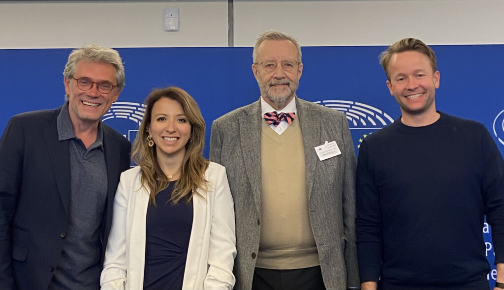 From left, the general secretary of Volt, Achille Coenegracht; co-President Francesca Romana D’Antuono; Toomas Hendrik Ilves; and Volt MEP Reinier van Lanschot. Photo by Volt Europa.