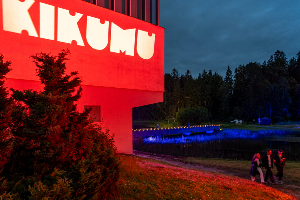 Set in a secluded landscape of forest and water, KiKuMu unfolded across four distinct stages – two indoors and two beneath the open sky, including one beside the lake. Photo by Andrea Forlani.