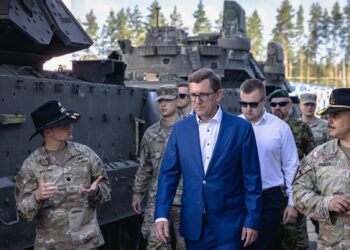Estonia’s prime minister, Kristen Michal, with NATO troops stationed in Estonia, August 2025. Photo by Stenbock House.