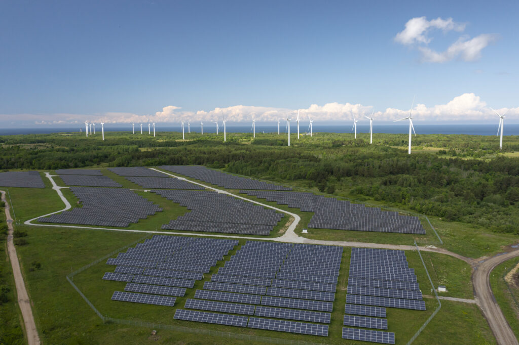 Solar panels and wind turbines in Estonia. Photo by Johannes Arro.