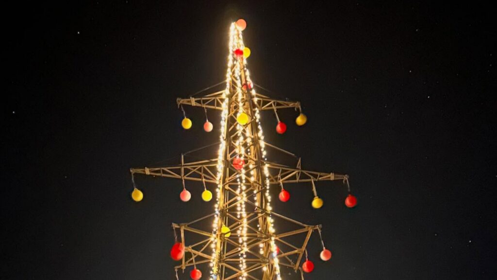 In Estonia, a disused power pylon on Saaremaa lights up as a Christmas tree, marking an unlikely environmental victory. Photo by Heiki Hanso.