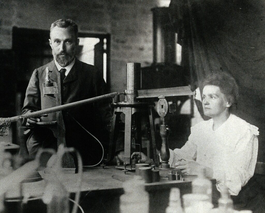 Pierre and Marie Curie in their laboratory, c. 1904. Photo: public domain.