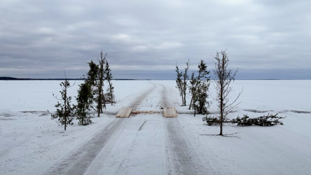 The ice road only looks serene: blue-clear ice can turn to grinding snow in metres, with sudden cracks – sometimes wide ones – along the way. Photo by David Millington.