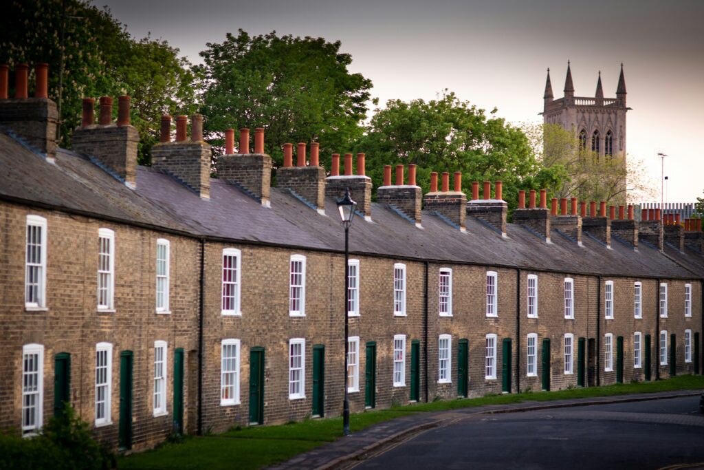 Homes in the UK, where mortgage rules can make it easier for young families to repay their loans faster and build long-term security. Photo by Ben Wicks / Unsplash.