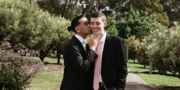 A same-sex couple celebrating their marriage. Photo by Joeyy Lee/Unsplash.