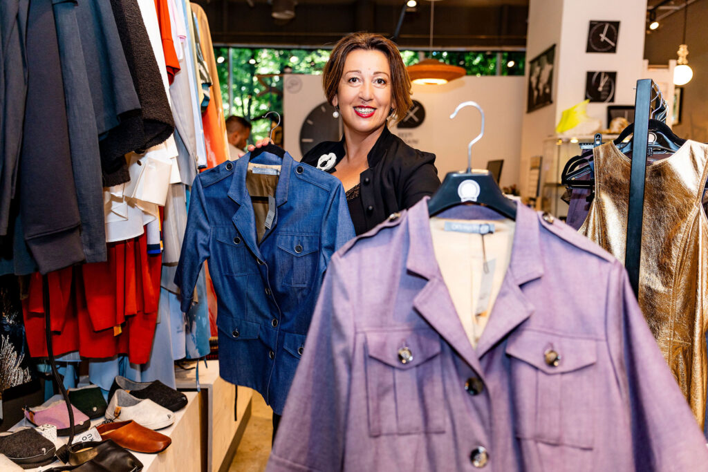 Oksana Tandit among pieces from her collection at her Tallinn pop-up shop. Photo: Liis Mutli Photography.