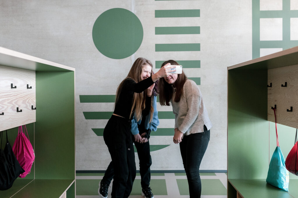 Students take a selfie at an Estonian school. Digital devices are firmly embedded in school life, although 36% of pupils told PISA that their classmates were often distracted by them during science lessons. Photo by Renee Altrov.