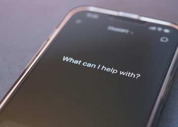 A cell phone screen with an AI assistant ready to help. Photo by Tim Witzdam on Unsplash.